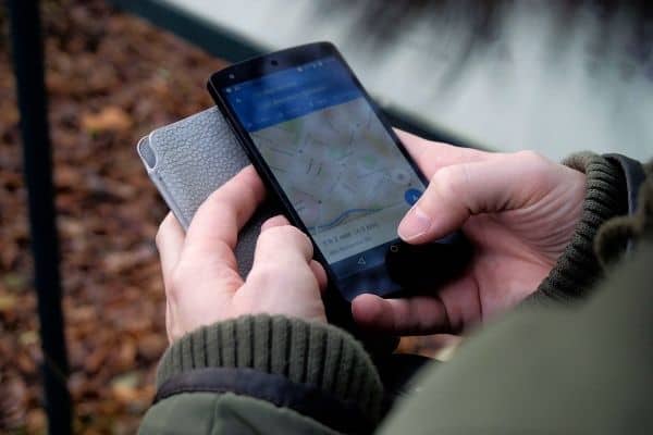 person using google maps on mobile phone